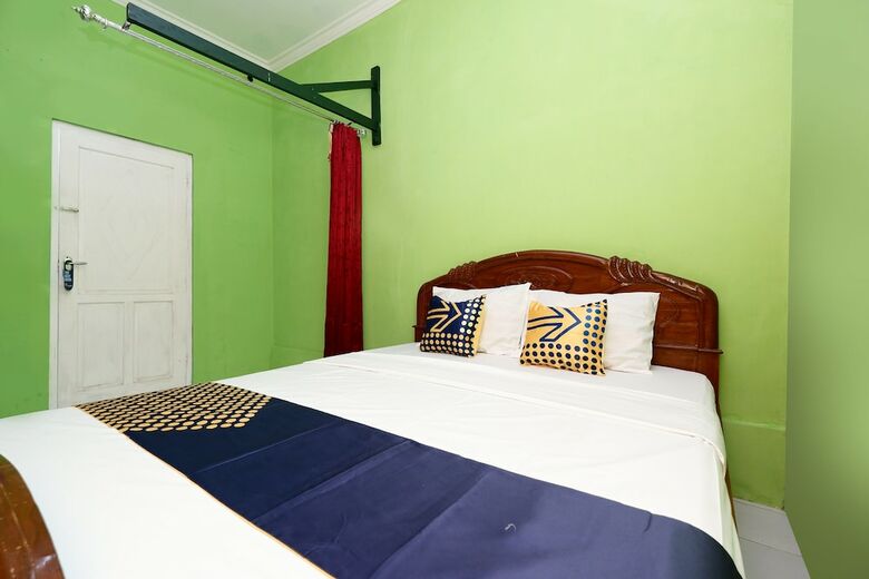Hostal Spot On 2106 Homestay Flamboyan