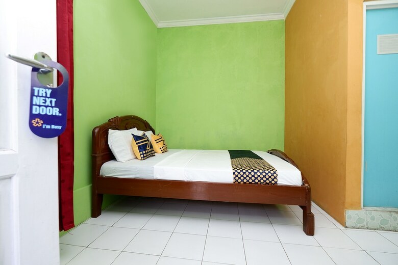 Hostal Spot On 2106 Homestay Flamboyan