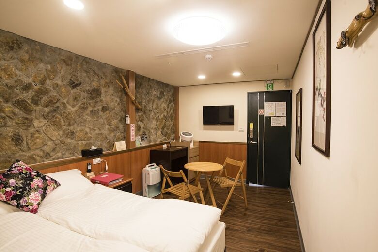 Hotel Qu Hi Home Stay