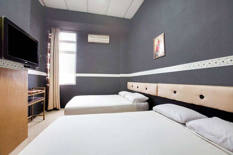 Spot On 89644 Retto Hotel