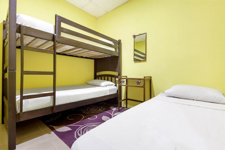 Spot On 89644 Retto Hotel