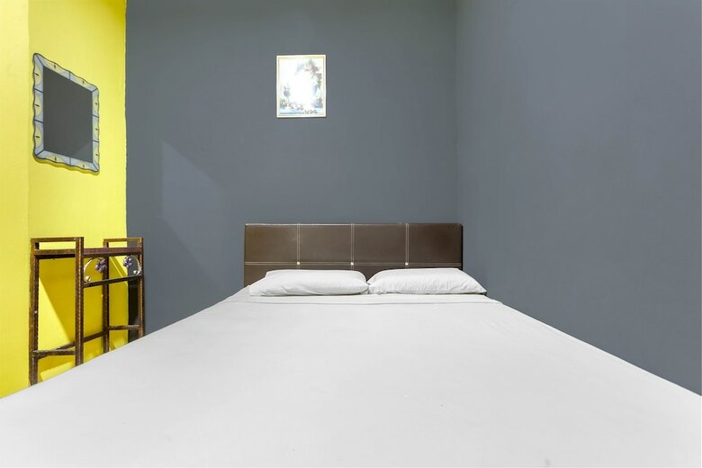 Spot On 89644 Retto Hotel