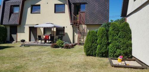 T�he Holiday Home