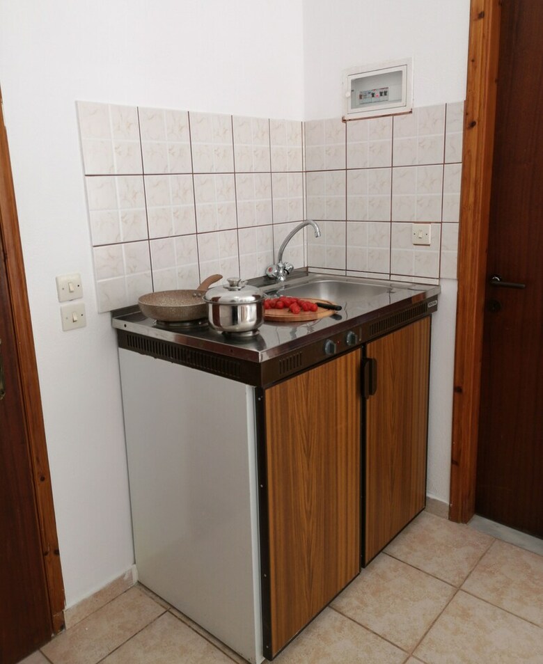 Apartamentos Faro Del Porto