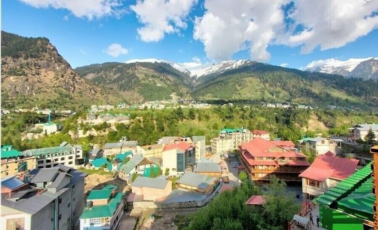 Apple Bud Cottages And Hotels