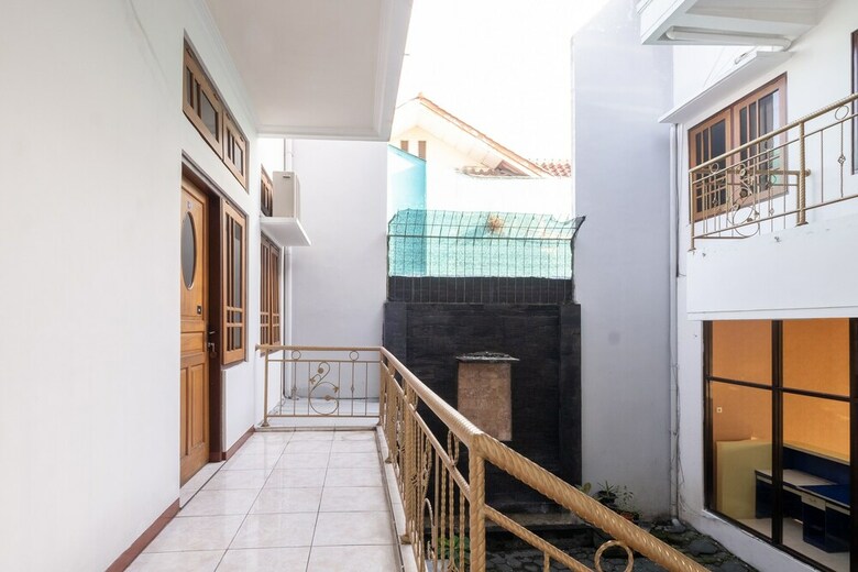 Hostal Oyo 2469 Cashlez Homestay