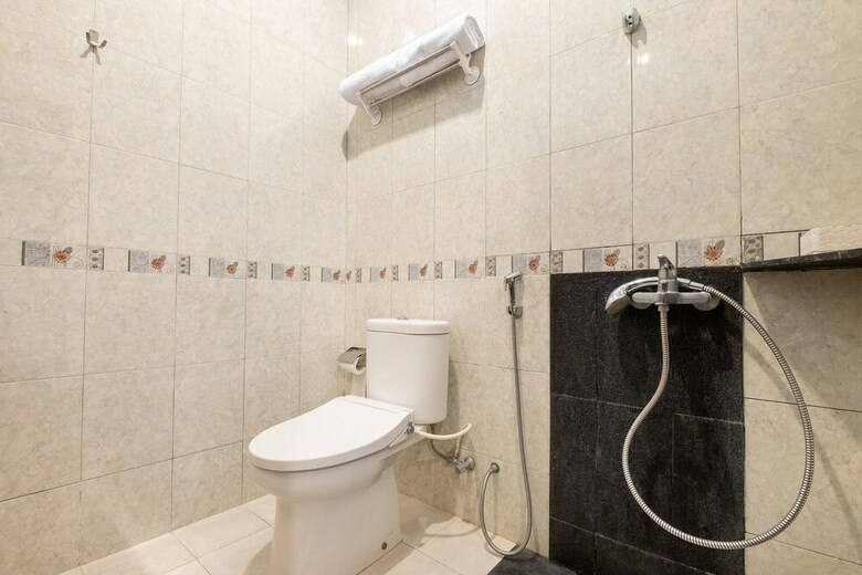 Hostal Oyo 2469 Cashlez Homestay