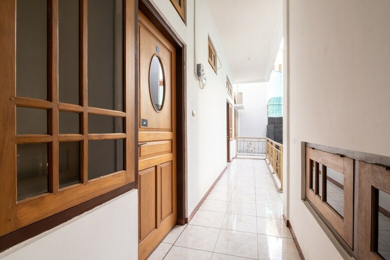 Hostal Oyo 2469 Cashlez Homestay
