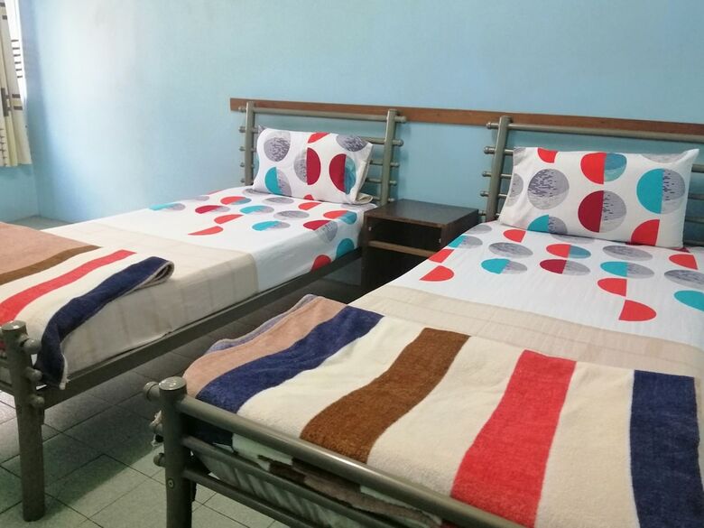 Spot On 89989 Wispering Hotel
