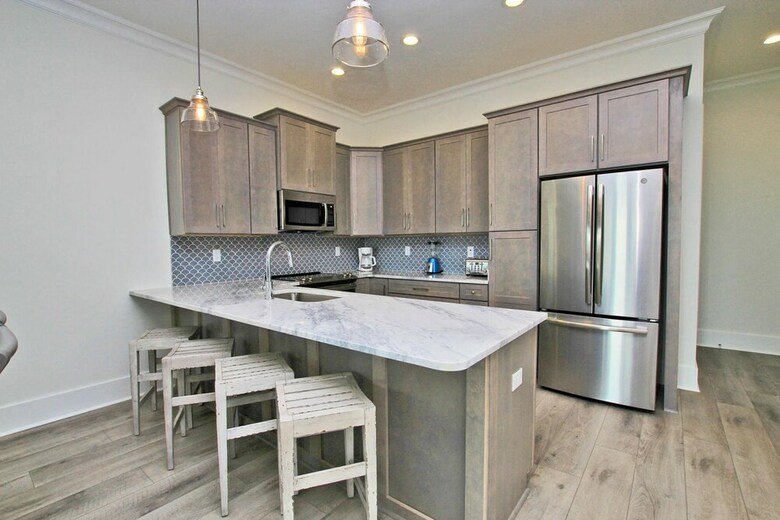 West Side Cottages Unit B By Youngs Suncoast