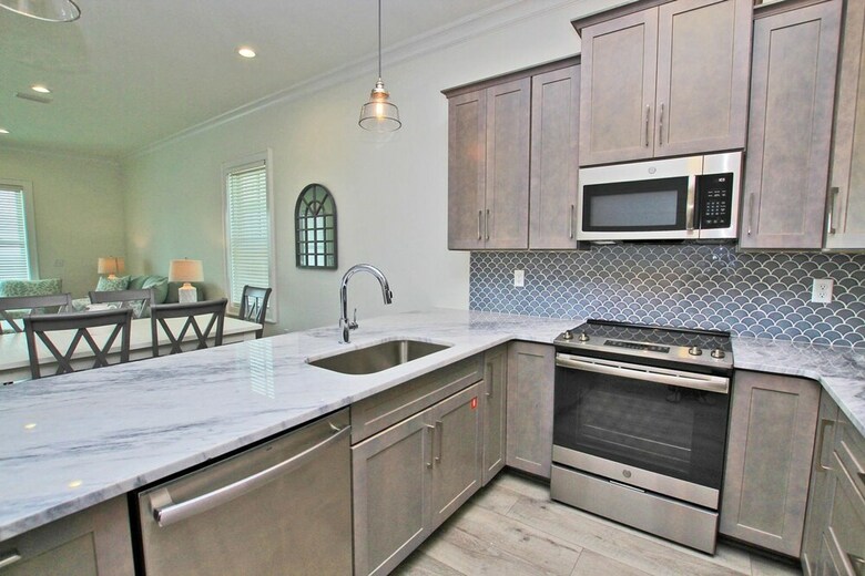 West Side Cottages Unit B By Youngs Suncoast