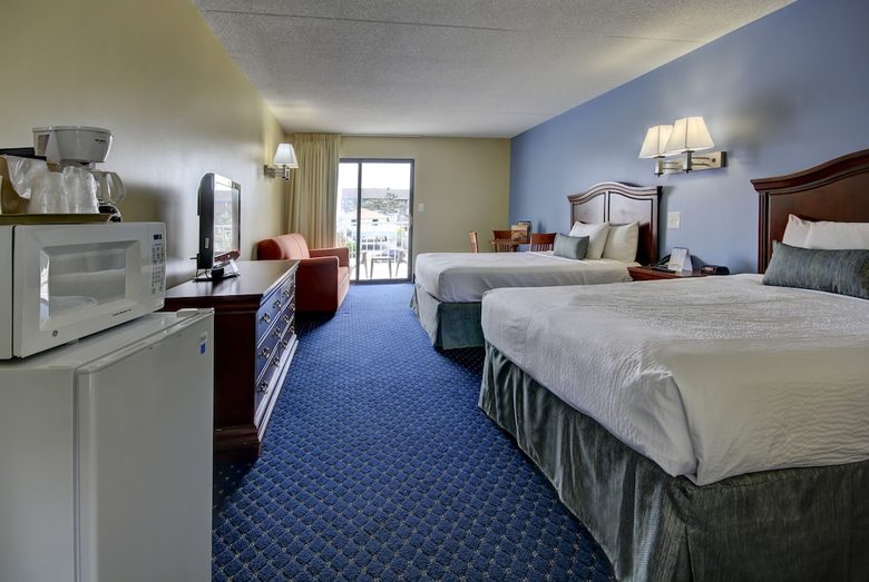 Apartamento Coastal Palms Inn & Suites