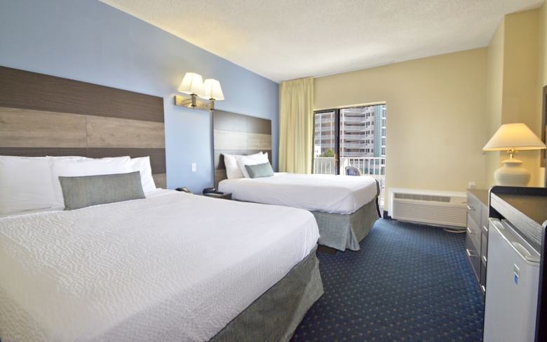 Apartamento Coastal Palms Inn & Suites