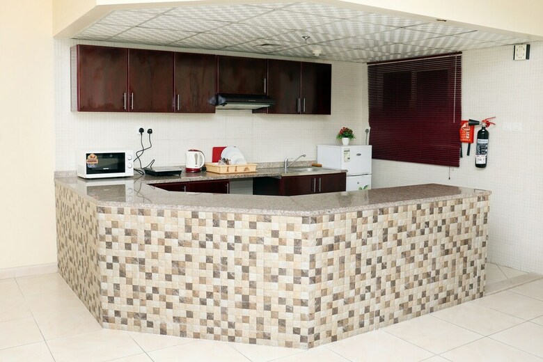 Oyo 150 Al Usra Furnished Apartments