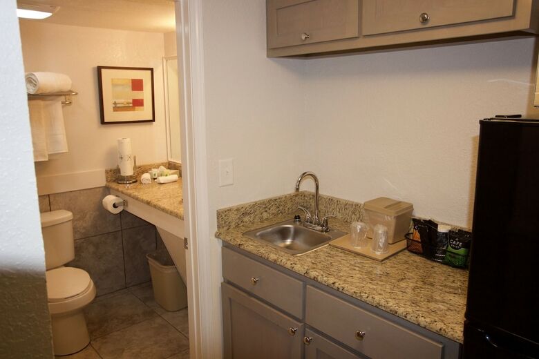 Hotel At Home Inn & Suites