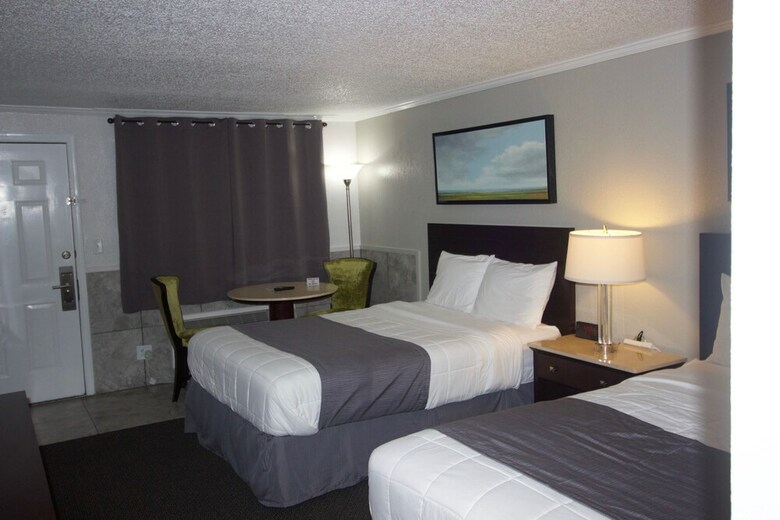 Hotel At Home Inn & Suites