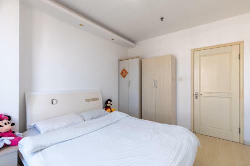 Hotel Dalian Xiu Zhu Mansion Apartment