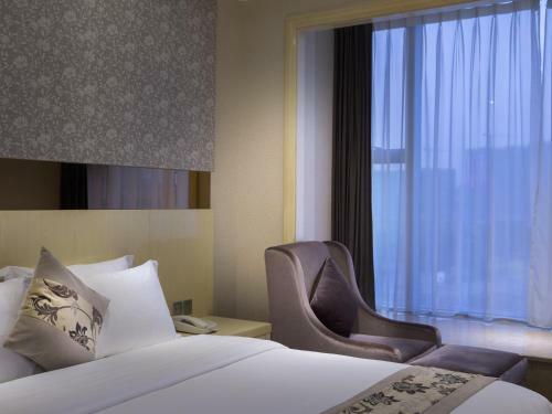 Paco Business Hotel Luo Gang Wan Da Branch