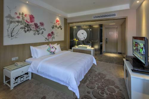 Paco Business Hotel Luo Gang Wan Da Branch