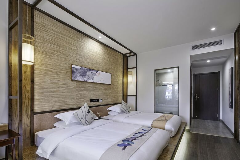 Posada Floral Hotel Deqing Qinzizaiju