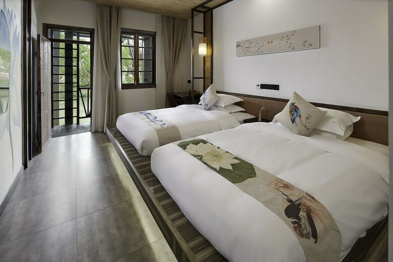 Posada Floral Hotel Deqing Qinzizaiju
