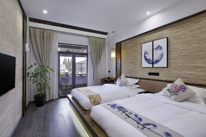 Posada Floral Hotel Deqing Qinzizaiju