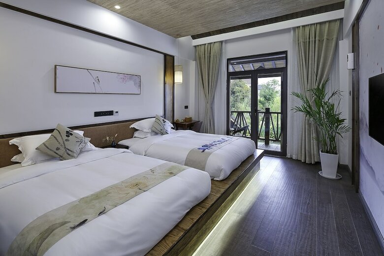 Posada Floral Hotel Deqing Qinzizaiju