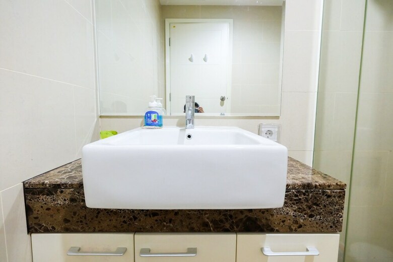 1br Apartment With Big Sofa Bed At Casa Grande Residence