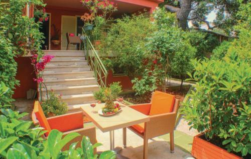 Three-bedroom Holiday Home In Artemida