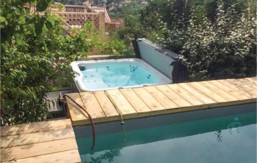 Two-bedroom Holiday Home In Montegrossu