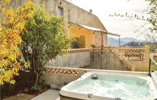 Two-bedroom Holiday Home In Montegrossu