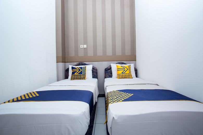 Hostal Capital O 2205 Hotel 3 Intan