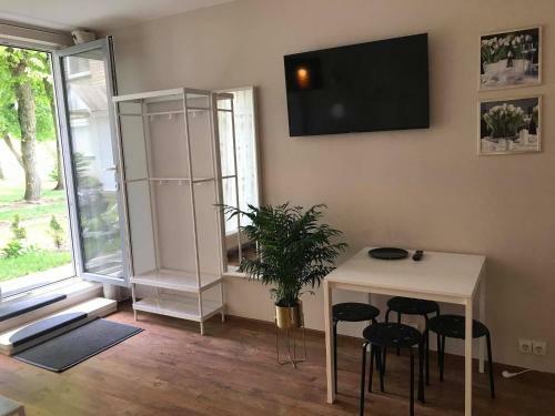 Apartamentai-ramus Poilsis