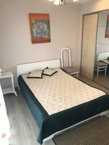 Apartamentai-ramus Poilsis