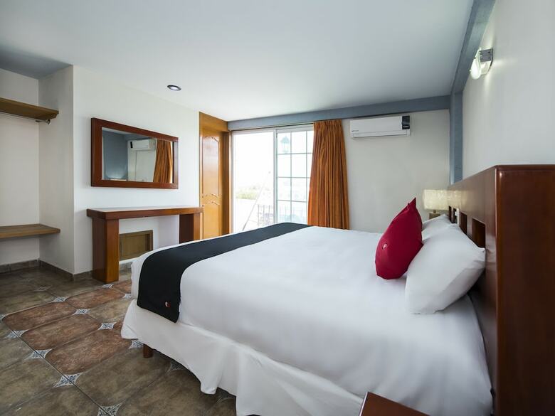 Hotel Capital O Suites de Reyes