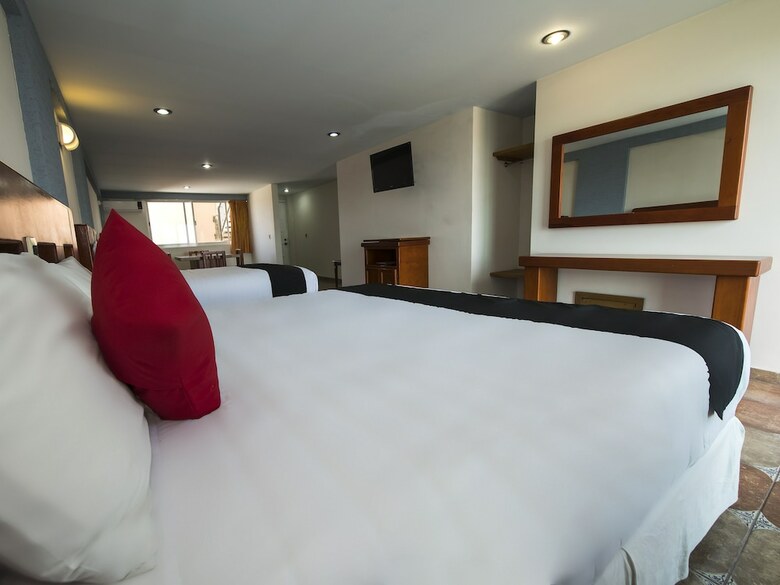 Hotel Capital O Suites de Reyes