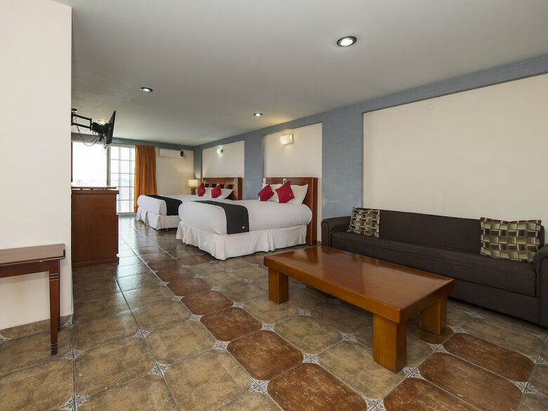 Hotel Capital O Suites de Reyes