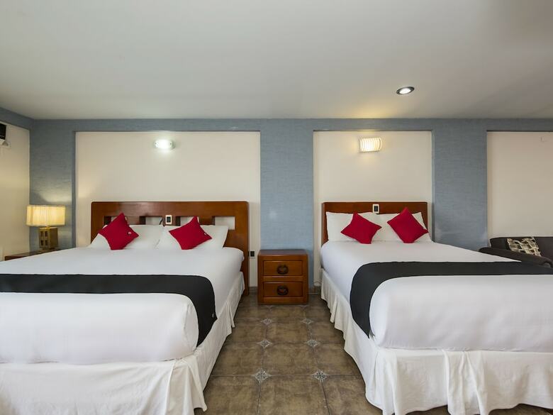 Hotel Capital O Suites de Reyes