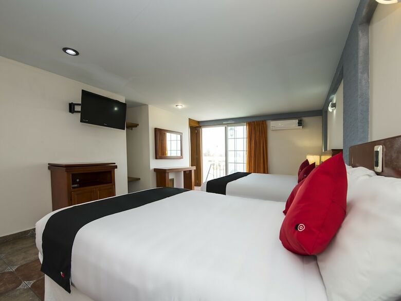Hotel Capital O Suites de Reyes