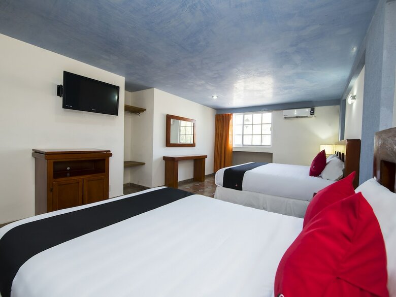 Hotel Capital O Suites de Reyes