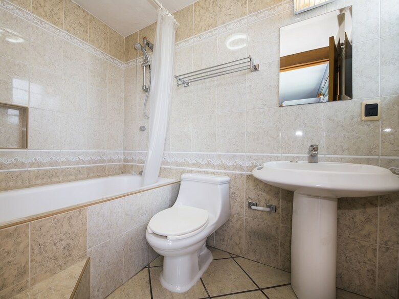 Hotel Capital O Suites de Reyes