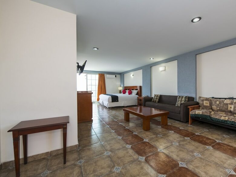 Hotel Capital O Suites de Reyes