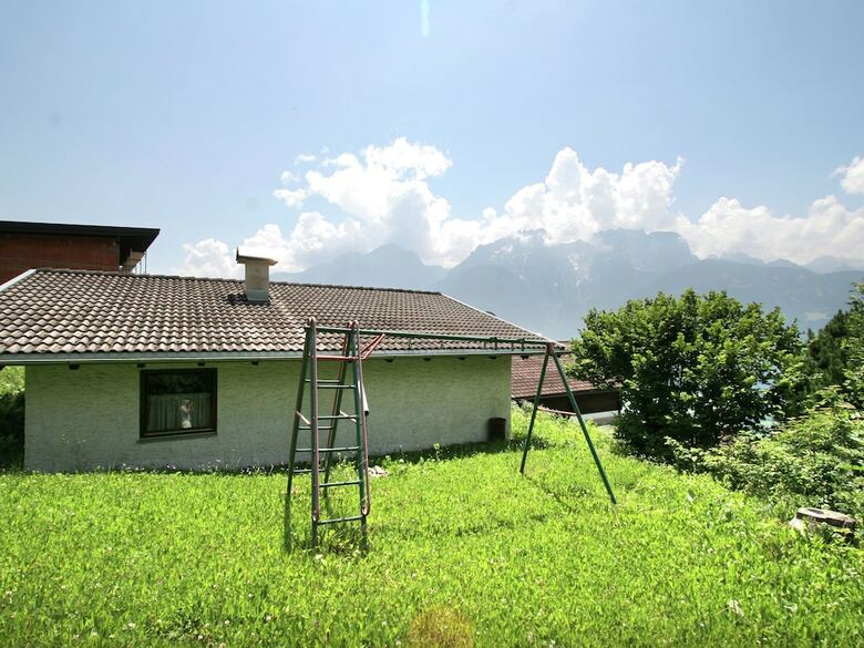 Quaint Chalet With Garden, Terrace, Fireplace,play Equipment