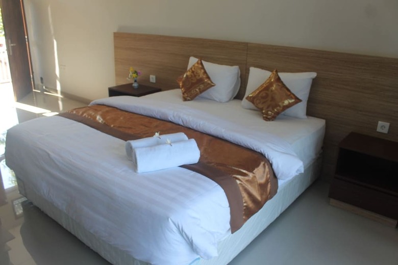 Hotel Mandhasativa Homestay
