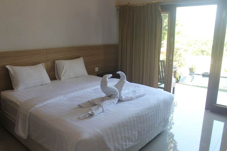 Hotel Mandhasativa Homestay