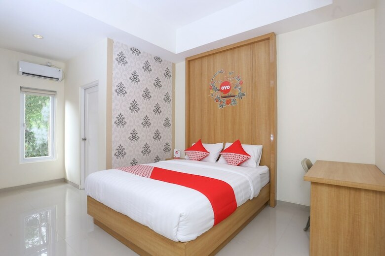 Hostal Oyo 999 Garuda Guesthouse