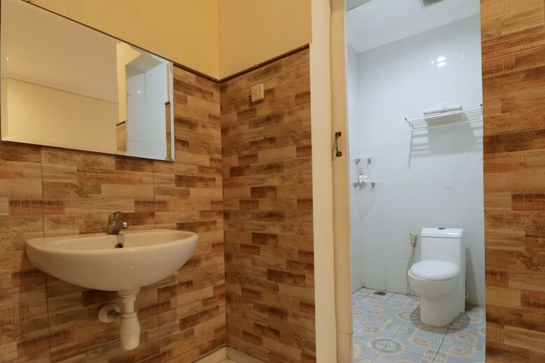 Hostal Oyo 1117 New Garuda Hotel