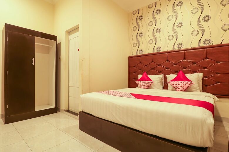 Hostal Oyo 1117 New Garuda Hotel
