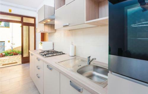 Two-bedroom Apartment In Rabac