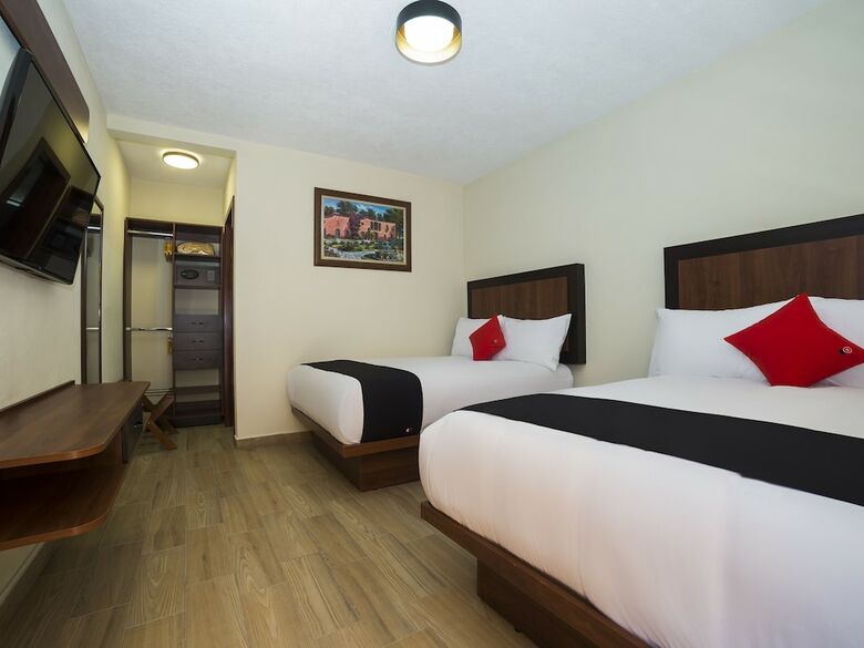 Capital O Hotel Colonial Acopinalco Inn